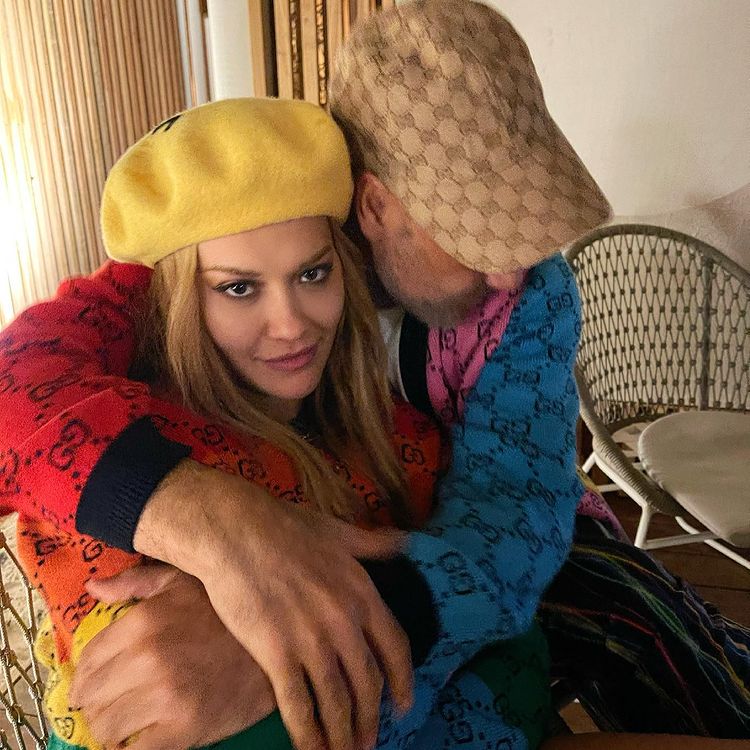 Rita Ora hugging her husband Taika Waititi